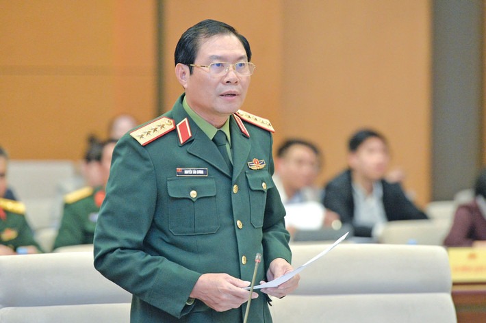 Đại tướng Nguyễn T&acirc;n Cương tr&igrave;nh b&agrave;y dự &aacute;n Luật T&igrave;nh trạng khẩn cấp- Ảnh 1.