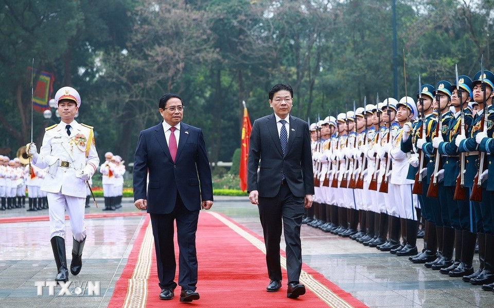 Thủ tướng Phạm Minh Chính chủ trì Lễ đón Thủ tướng Singapore và Phu nhân