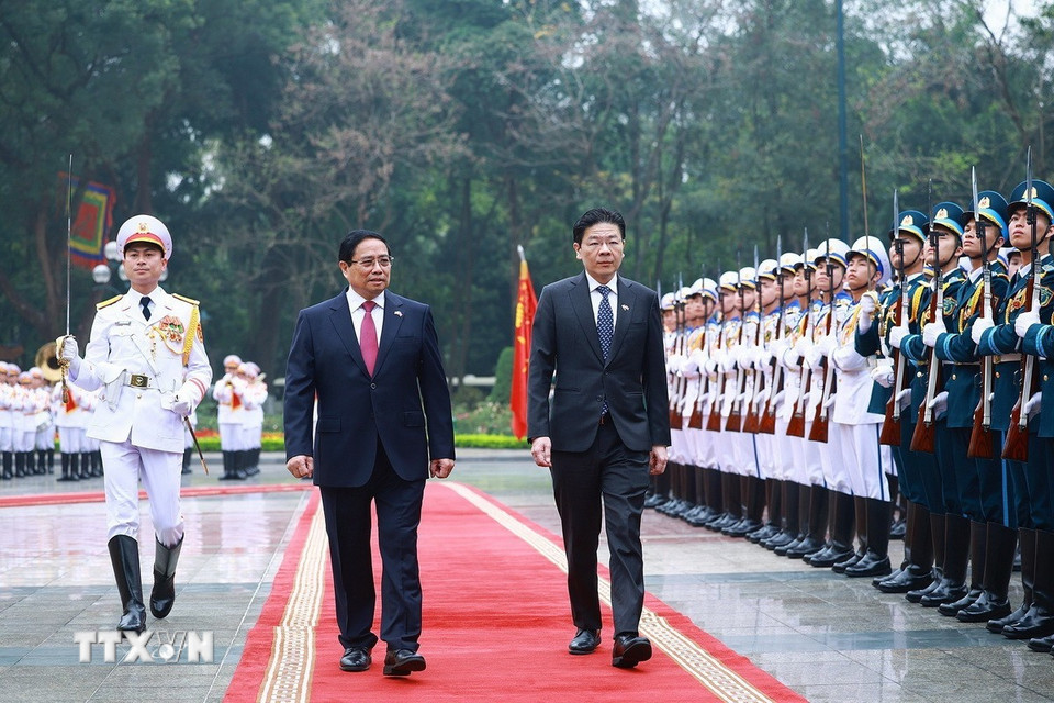 Thủ tướng Phạm Minh Chính chủ trì Lễ đón Thủ tướng Singapore và Phu nhân- Ảnh 1.