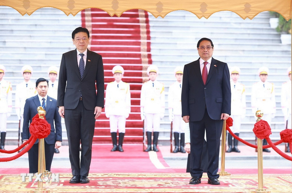 Thủ tướng Phạm Minh Chính chủ trì Lễ đón Thủ tướng Singapore và Phu nhân- Ảnh 9.