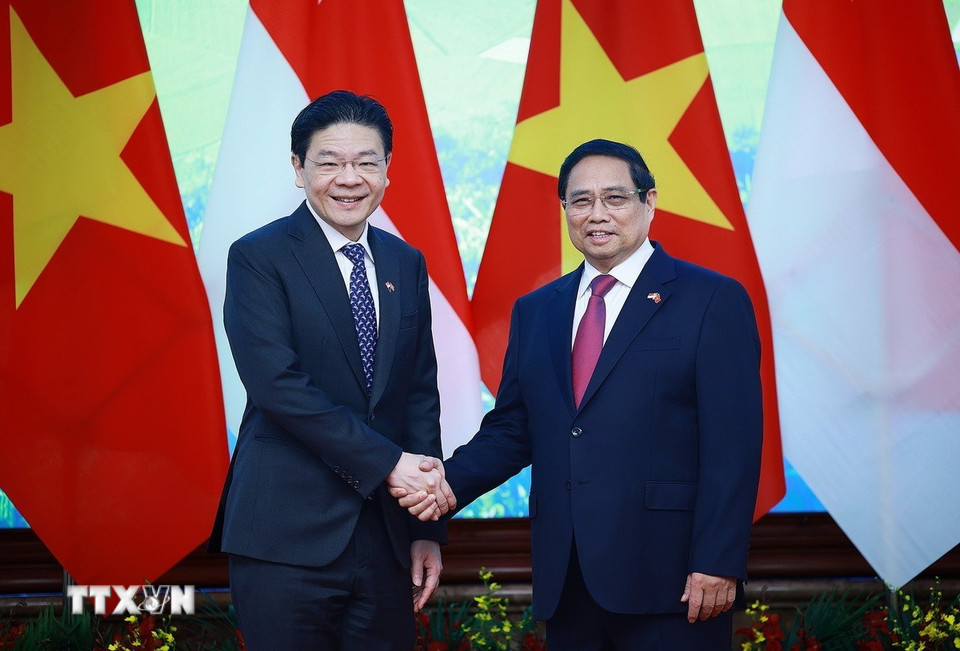 Thủ tướng Phạm Minh Ch&iacute;nh hội đ&agrave;m với Thủ tướng Singapore Lawrence Wong- Ảnh 2.