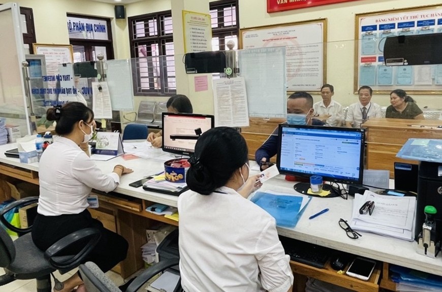 Mỗi phường, xã mới sau sắp xếp ở Hà Nội sẽ có bao nhiêu biên chế?- Ảnh 1.