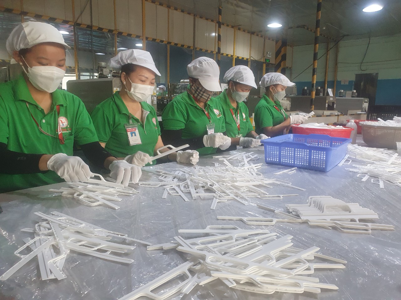 Lương tối thiểu &aacute;p dụng ra sao khi bỏ quận, huyện?- Ảnh 1.