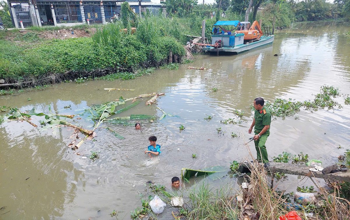 Vụ &aacute;n mạng đặc biệt nghi&ecirc;m trọng ở An Giang: Nữ nghi phạm l&agrave;m ở c&ocirc;ng ty vệ sĩ - Ảnh 4.