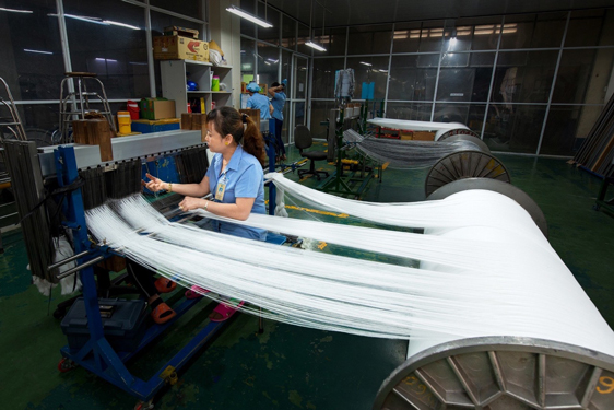 Tăng tốc xuất khẩu, chủ động th&iacute;ch ứng thương chiến - Ảnh 1.