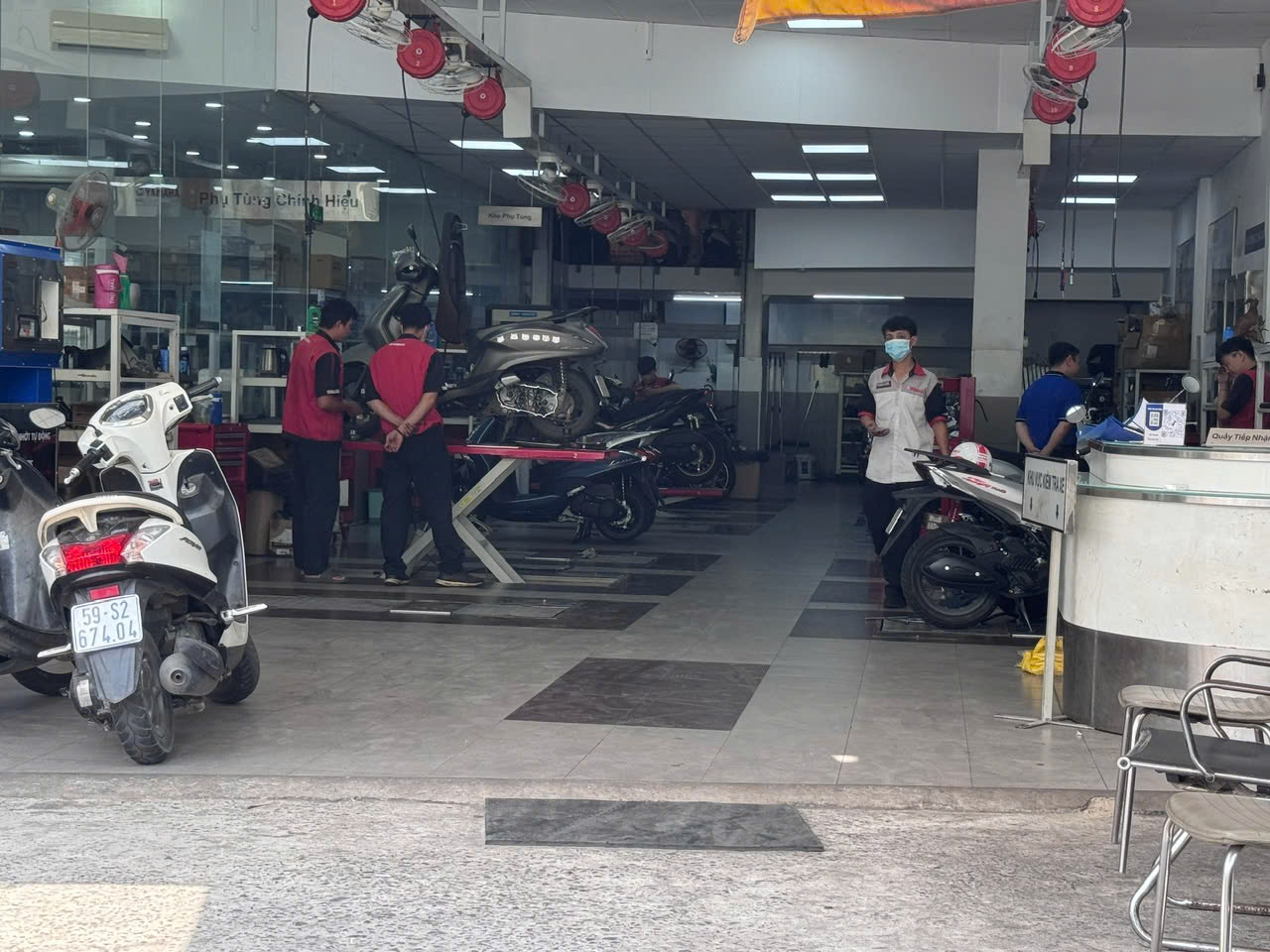 Siết kiểm định khí thải mô tô, xe máy- Ảnh 1.