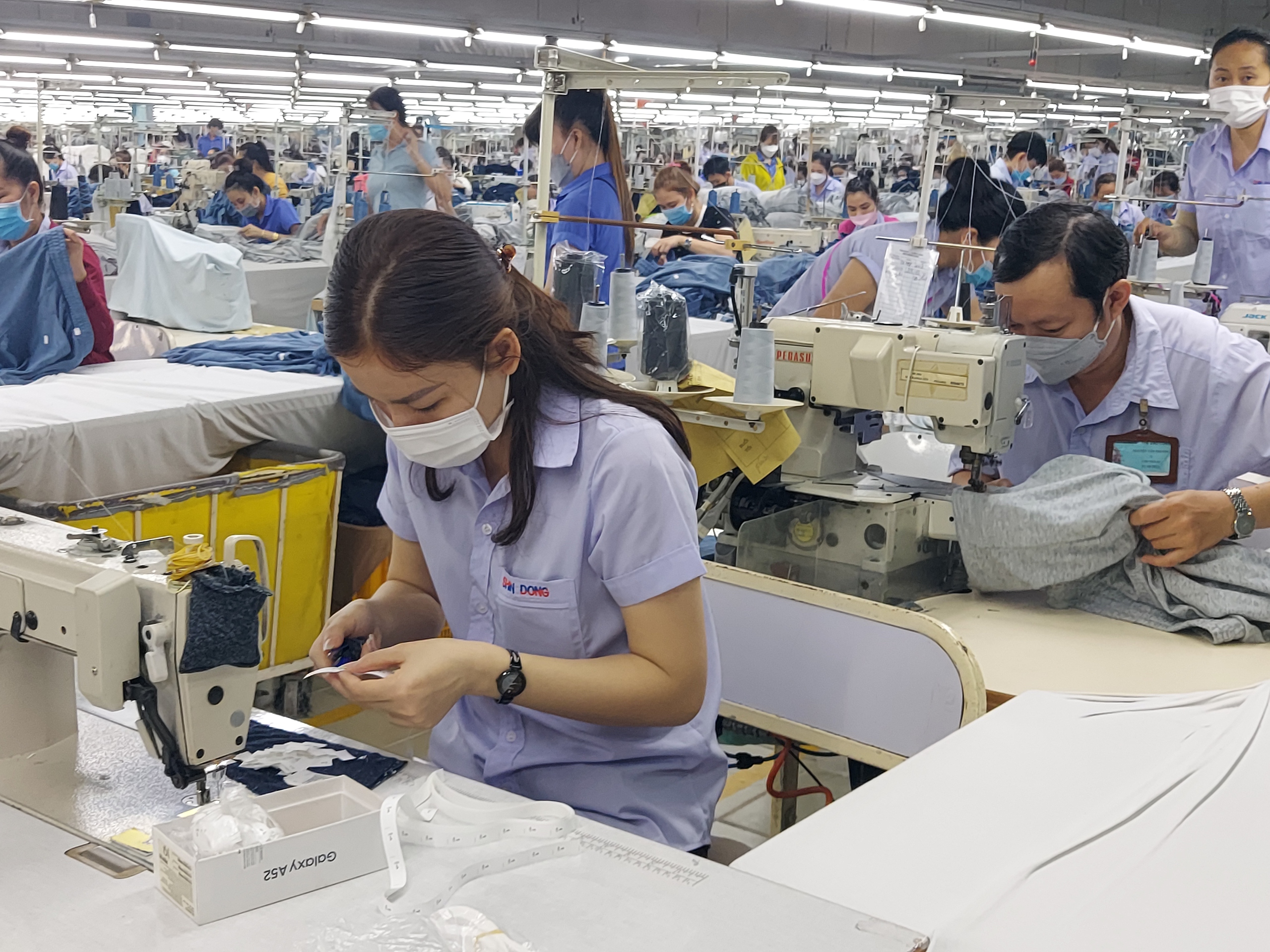 Lương tối thiểu tăng 7,2% sẽ tác động đến doanh nghiệp ra sao? - Ảnh 1.