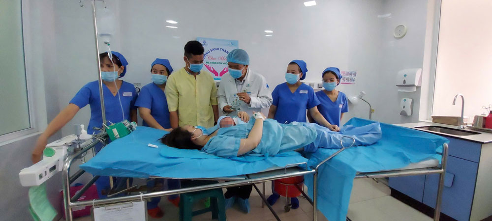 Cần nhiều chính sách hỗ trợ sinh con - Ảnh 1.