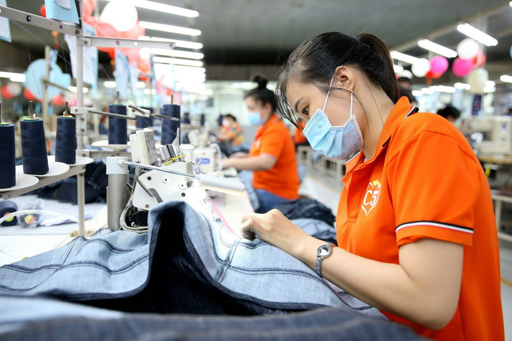 Giảm gánh nặng cho người lao động - Ảnh 1.