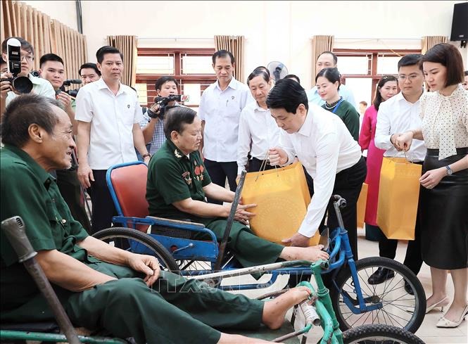 Chủ tịch nước Lương Cường: Chính sách ưu đãi người có công là nhiệm vụ thường xuyên, lâu dài - Ảnh 1.
