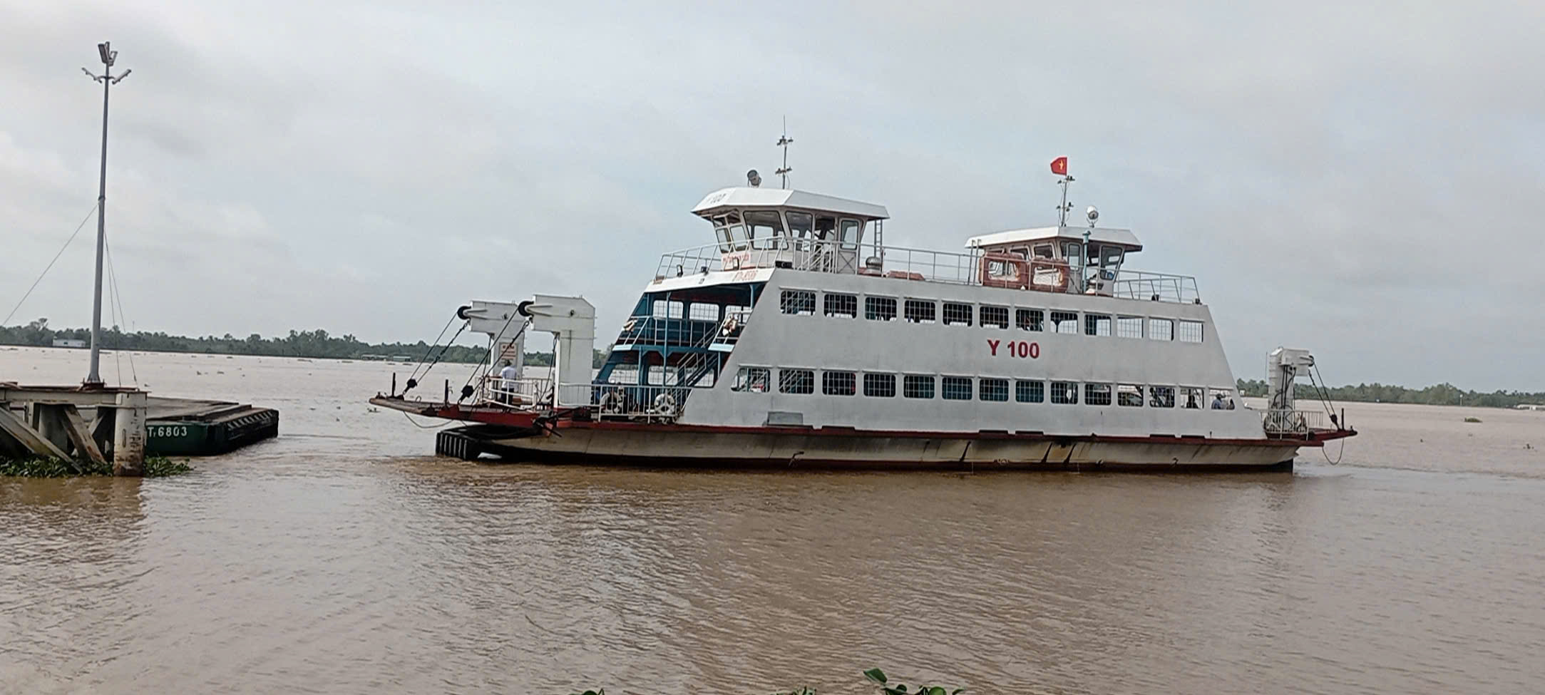 Lượng phương tiện qua cầu Rạch Miễu 2 tăng mạnh sau khi th&ocirc;ng xe - Ảnh 8.