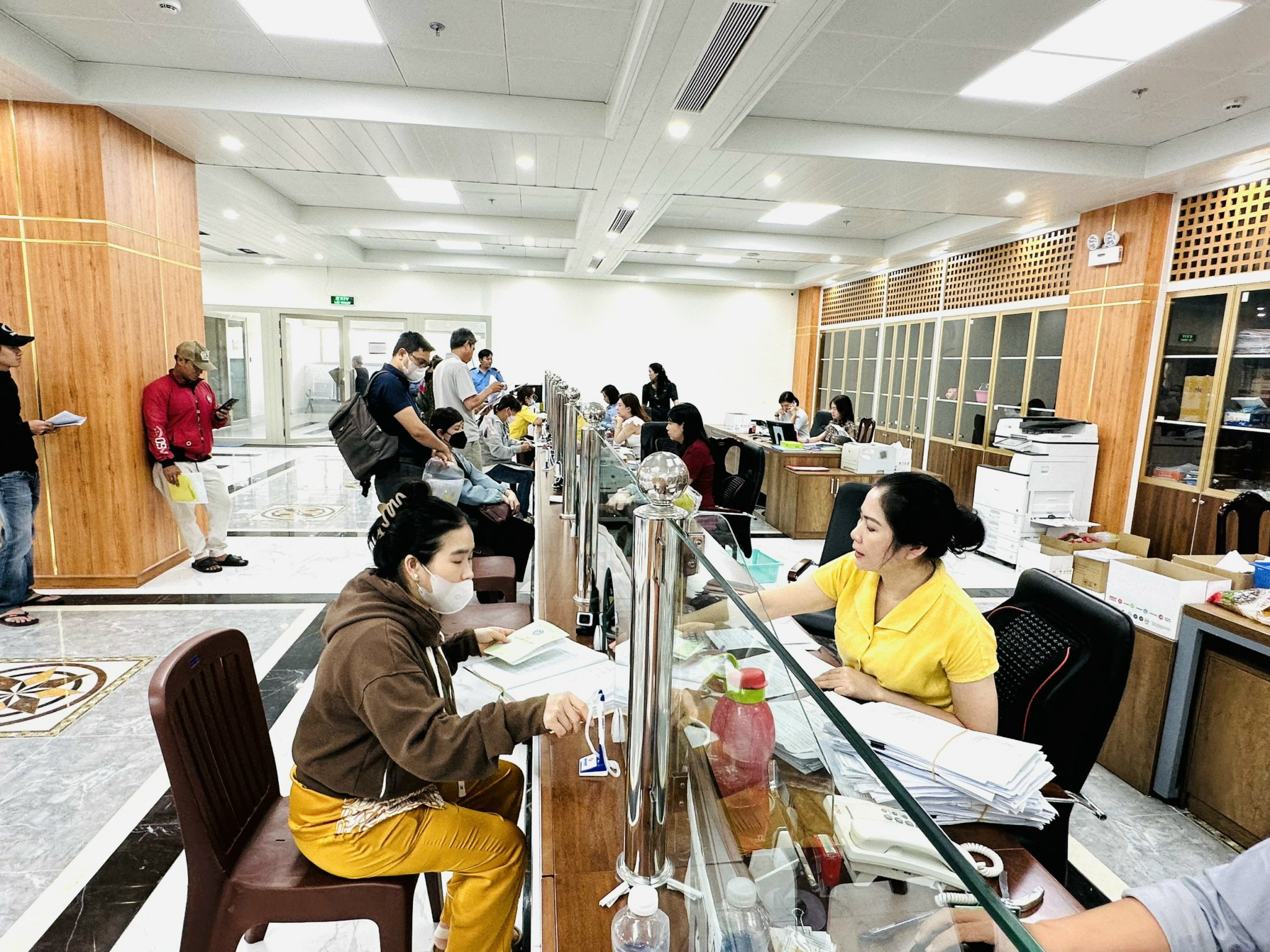 TPHCM: Nộp và nhận kết quả BHXH tại một điểm duy nhất - Ảnh 1.