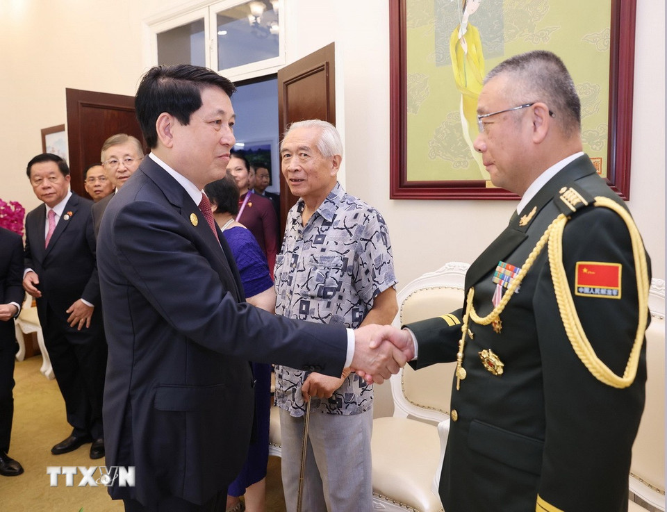 Chủ tịch nước Lương Cường xúc động gặp mặt gia đình các nhân sĩ hữu nghị Trung Quốc- Ảnh 1.