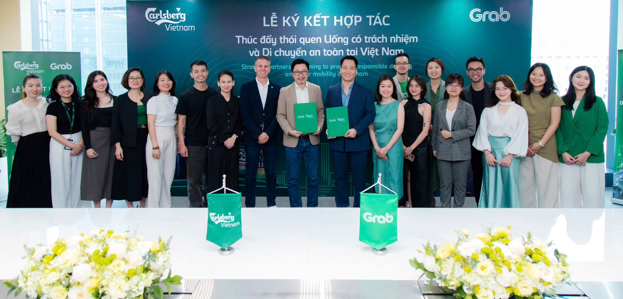 Carlsberg Việt Nam v&agrave; Grab hợp t&aacute;c th&uacute;c đẩy th&oacute;i quen di chuyển an to&agrave;n - Ảnh 1.