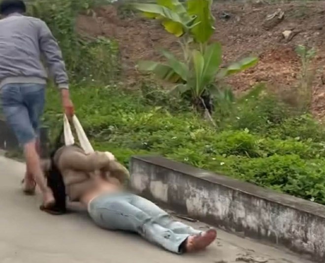 Khởi tố B&agrave;n Văn Huấn về h&agrave;nh vi g&acirc;y rối trật tự trong vụ k&eacute;o bạn g&aacute;i tr&ecirc;n đường - Ảnh 2.