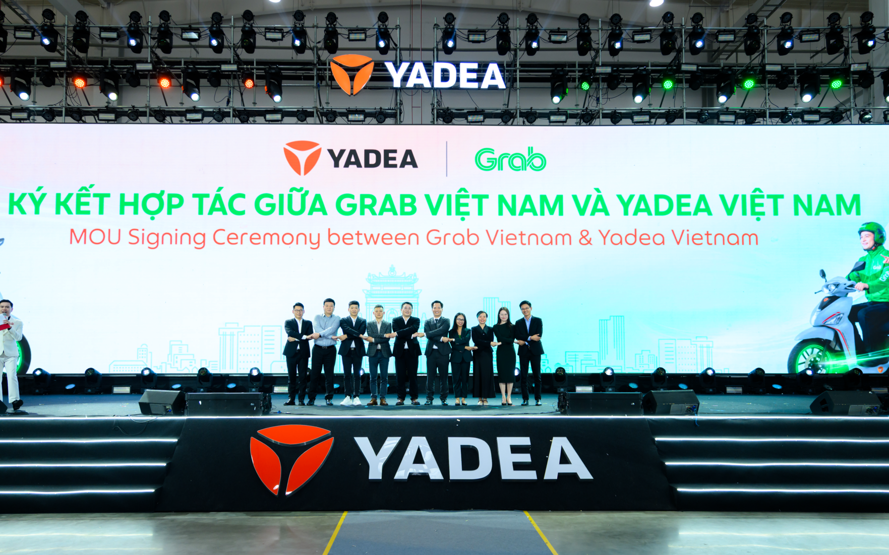 Grab Việt Nam hợp tác Yadea Việt Nam hỗ trợ tài xế chuyển đổi xe máy điện