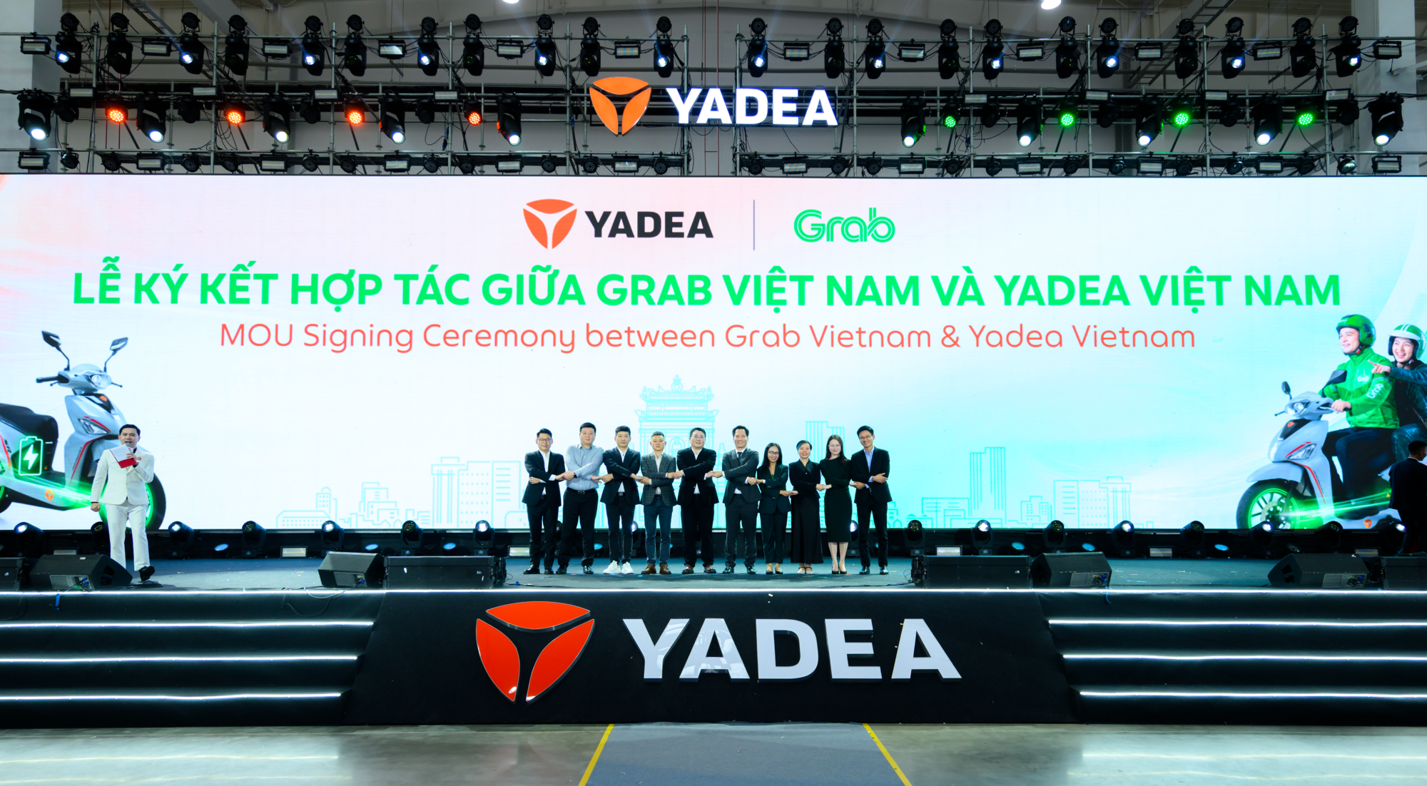 Grab Việt Nam hợp t&aacute;c Yadea Việt Nam hỗ trợ t&agrave;i xế chuyển đổi xe m&aacute;y điện - Ảnh 1.
