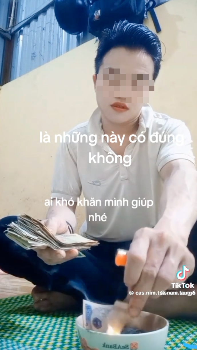 Xôn xao thanh niên đốt tiền rồi quay clip, luật quy định ra sao? - Ảnh 1.