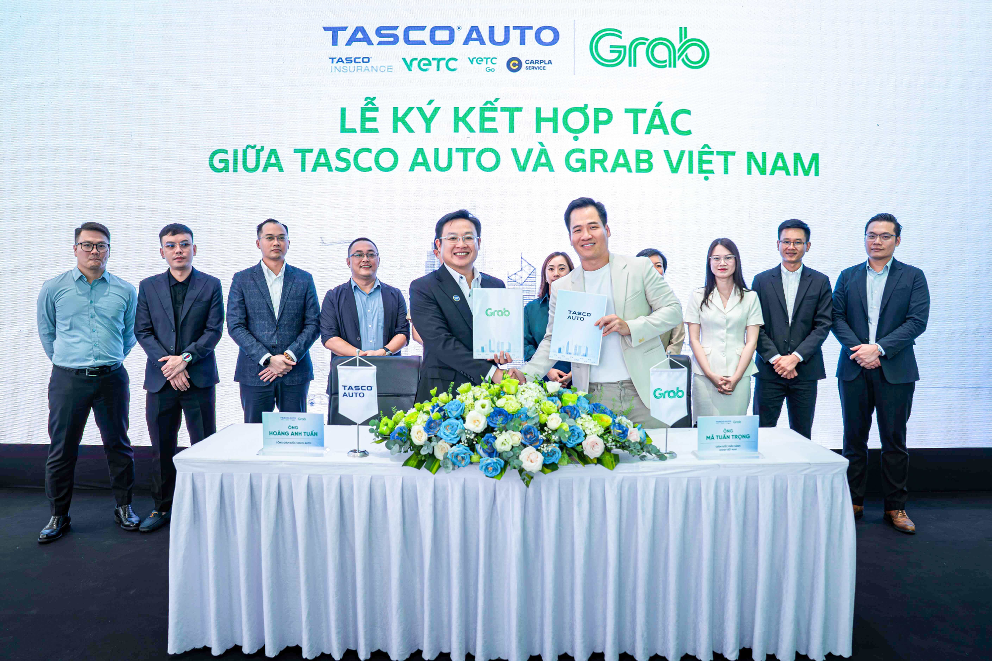 Grab Việt Nam v&agrave; Tasco Auto hợp t&aacute;c to&agrave;n diện th&uacute;c đẩy chuyển đổi xanh tại Việt Nam - Ảnh 1.