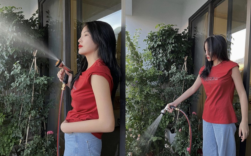 Kỳ Duy&ecirc;n ra ban c&ocirc;ng tưới c&acirc;y nhưng vẫn s&agrave;nh điệu kh&ocirc;ng k&eacute;m khi trang điểm đầy đủ, phối đồ trẻ trung