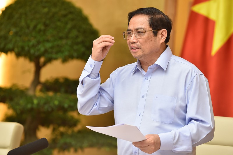 Thủ tướng Phạm Minh Ch&iacute;nh vừa k&yacute; ban h&agrave;nh Nghị quyết số 86/NQ-CP về c&aacute;c giải ph&aacute;p cấp b&aacute;ch ph&ograve;ng, chống dịch bệnh COVID-19 . Ảnh: VGP