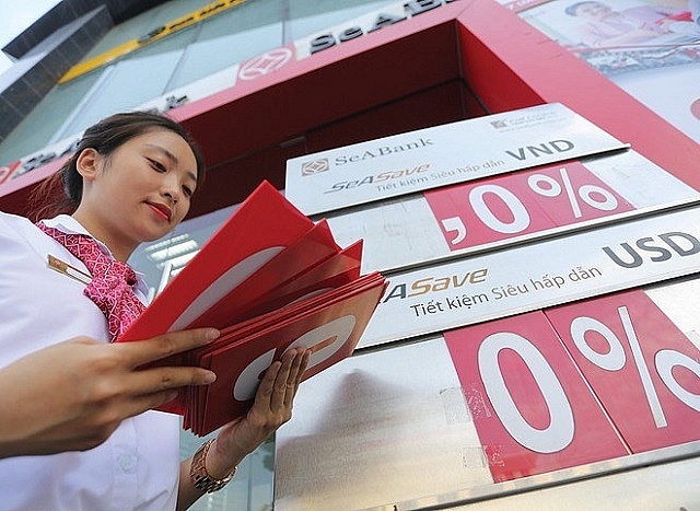 Nhiều ng&acirc;n h&agrave;ng đ&atilde; c&ocirc;ng bố giảm l&atilde;i suất cho doanh nghiệp, tuy nhi&ecirc;n mức giảm kh&ocirc;ng nhiều. Ảnh minh họa