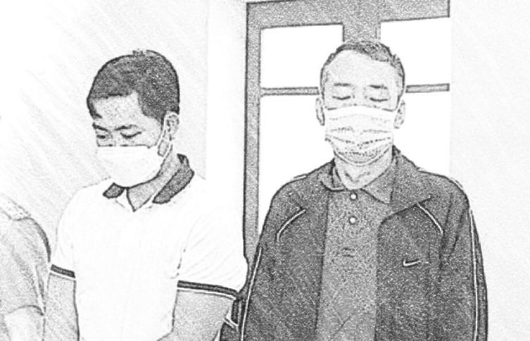 C&ocirc;ng an đọc lệnh bắt tạm giam L&ecirc; Thanh An v&agrave; Ho&agrave;ng Xu&acirc;n Kh&aacute;nh