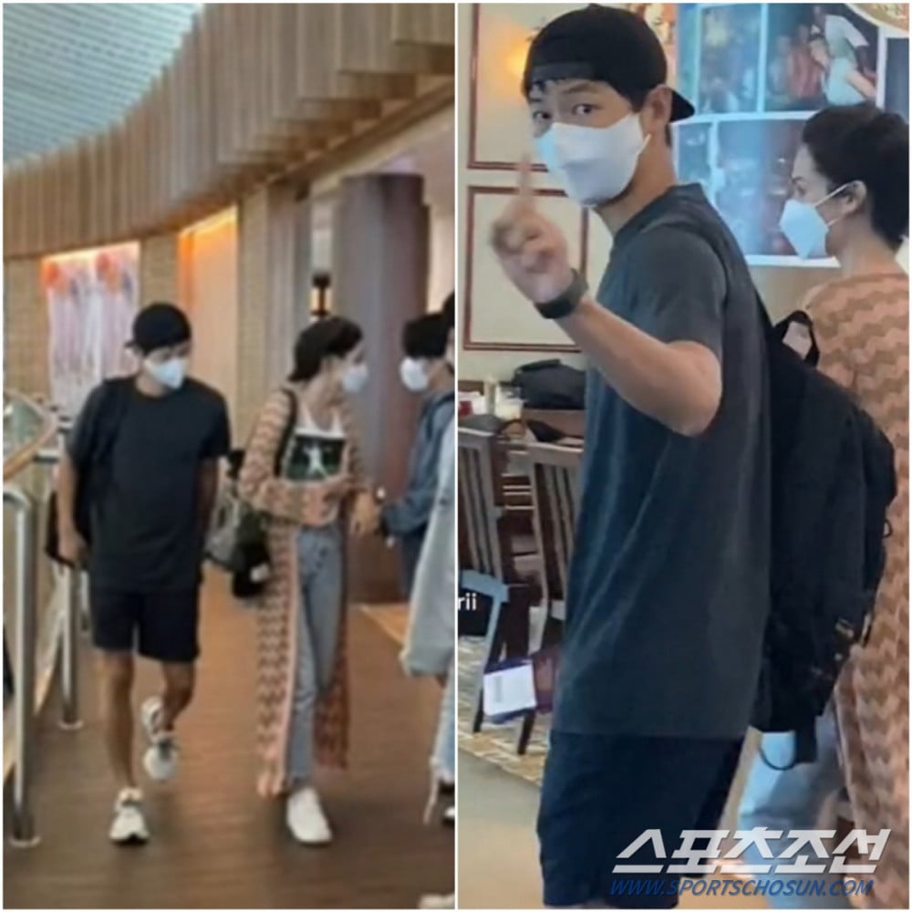 Song Joong Ki v&agrave; bạn g&aacute;i tại một s&acirc;n bay.