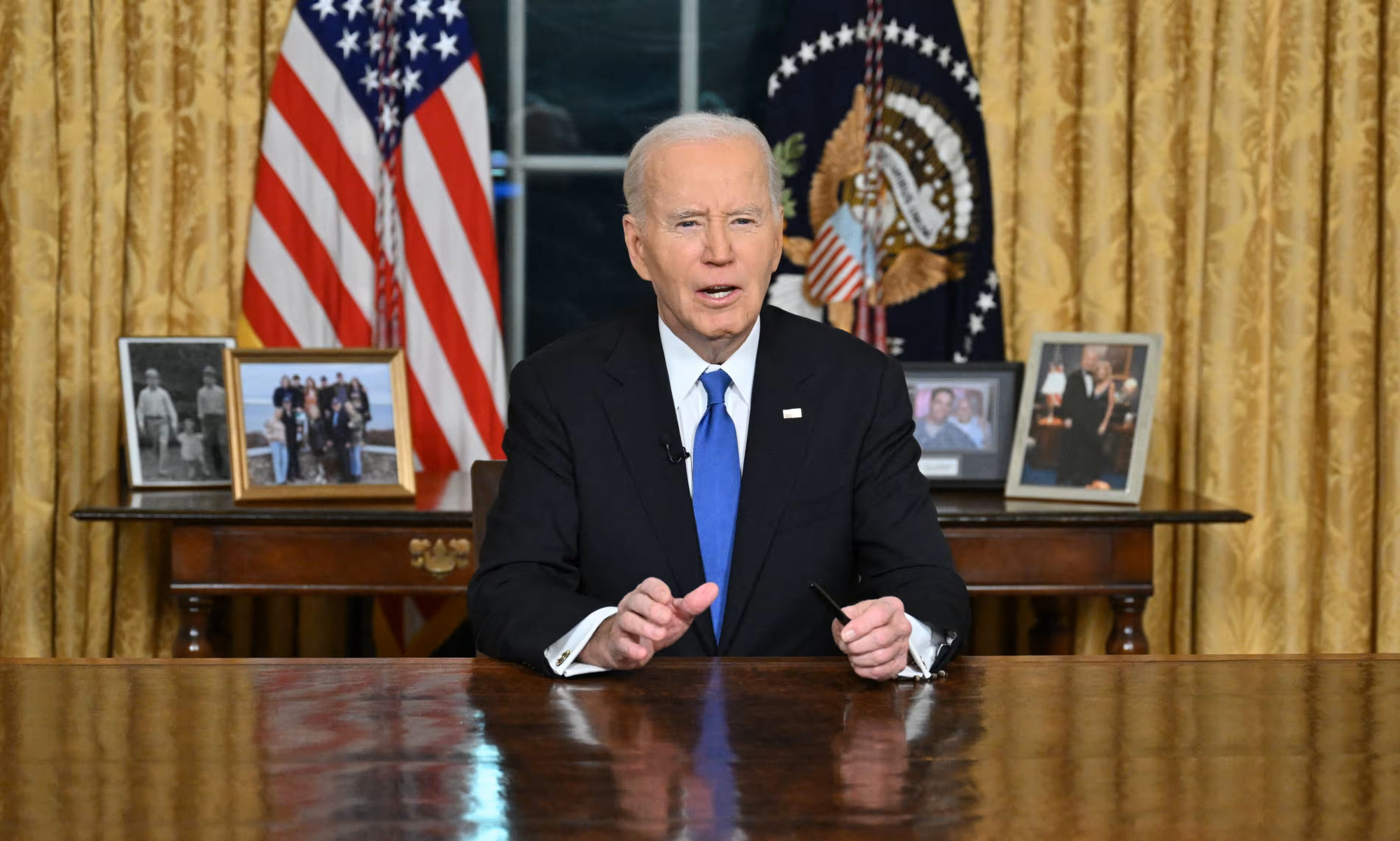 Tổng thống Joe Biden đọc diễn văn chia tay to&agrave;n quốc từ Ph&ograve;ng Bầu dục của Nh&agrave; Trắng - Ảnh: Roberto Schmidt/AFP/Getty Images