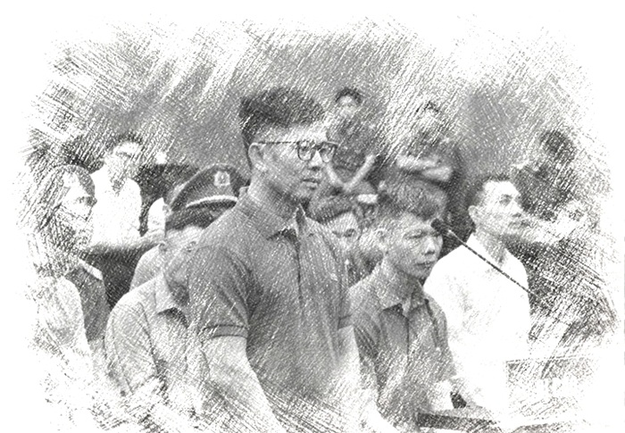 Bị c&aacute;o Nguyễn Duy Hưng khai b&aacute;o tại t&ograve;a - Ảnh: N.A