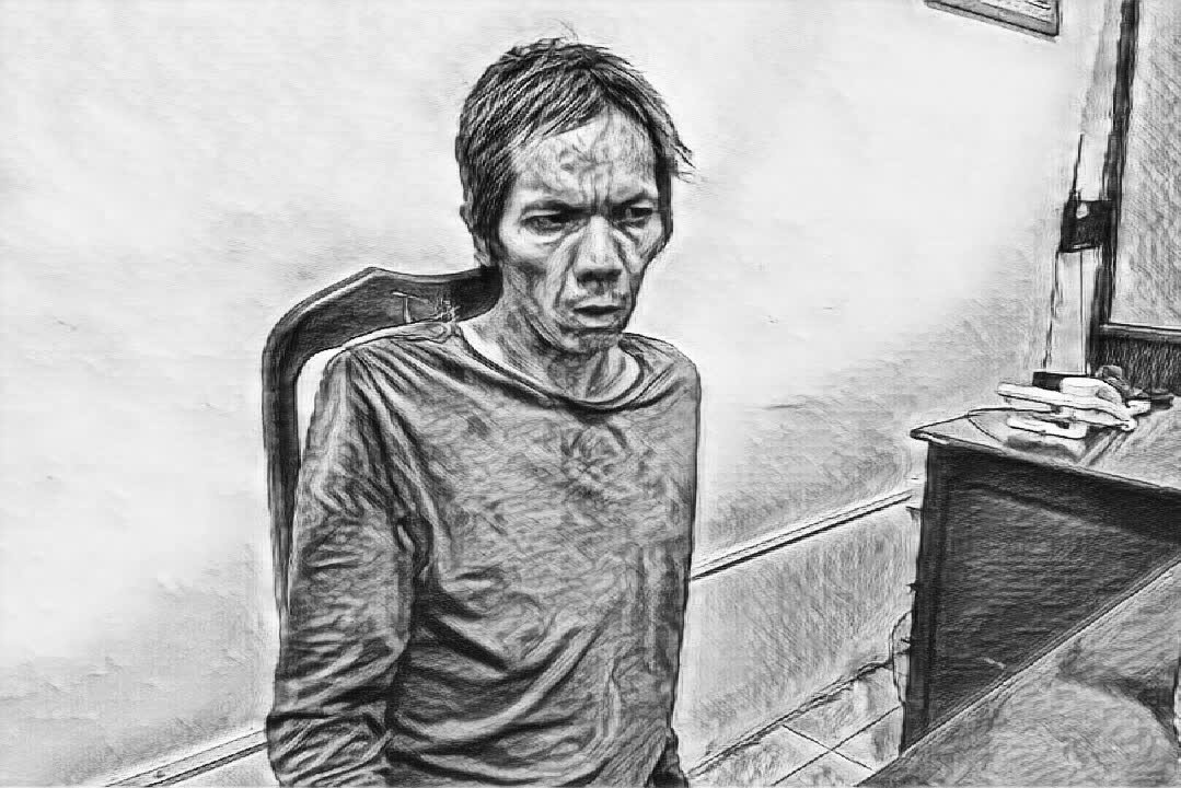 Đối tượng Trịnh Văn Tăng l&agrave;m việc tại cơ quan c&ocirc;ng an - Ảnh: S.Đ.