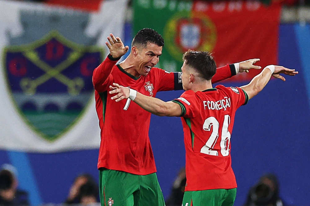 hlv-cua-bo-dao-nha-tuc-gian-tra-loi-nhung-cau-hoi-kho-ve-ronaldo (2).jpg