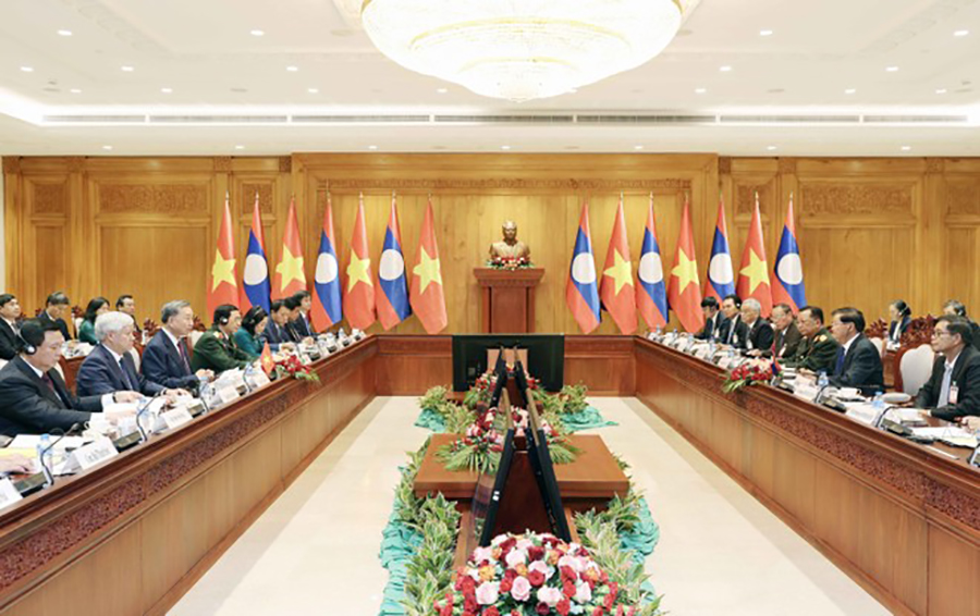 le-don-chinh-thuc-chu-tich-nuoc-to-lam-tham-cap-nha-nuoc-toi-lao.jpg