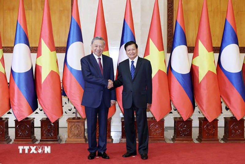 le-don-chinh-thuc-chu-tich-nuoc-to-lam-tham-cap-nha-nuoc-toi-lao-.jpg