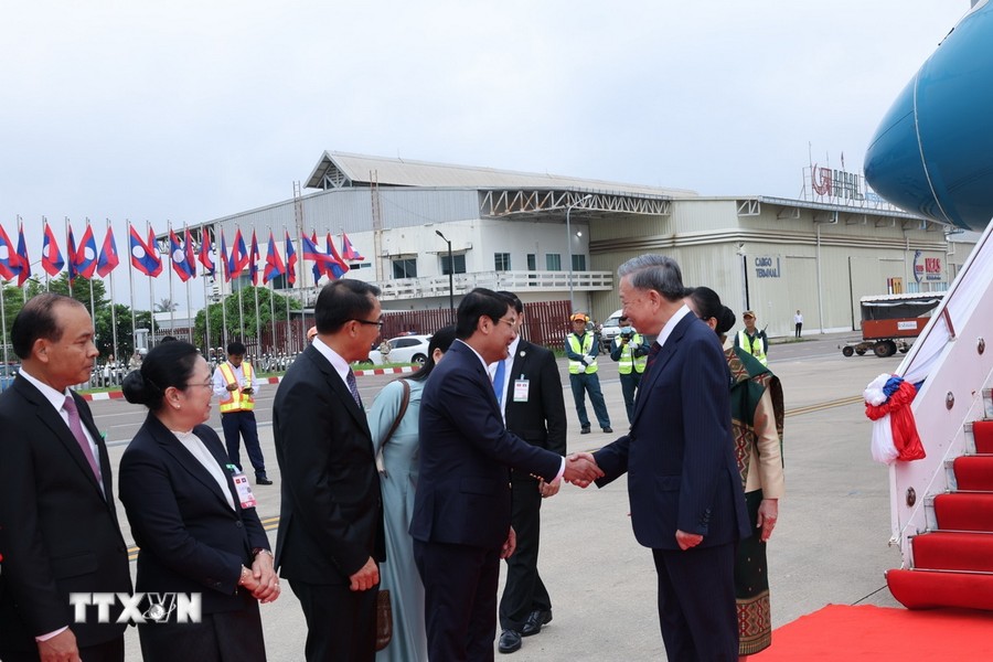ttxvn-1107-chu-tich-nuoc-to-lam-lao-2-5327.jpg