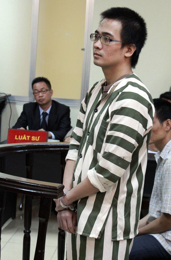 Nguyễn Đức Nghĩa tại phiên xử. Ảnh: Hà Anh.