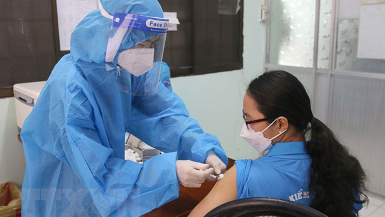 Vietnam looks to get 90% of adults fully vaccinated in coming days