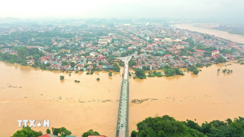Northern Vietnam braces for flooding as Red River swells to record highs
