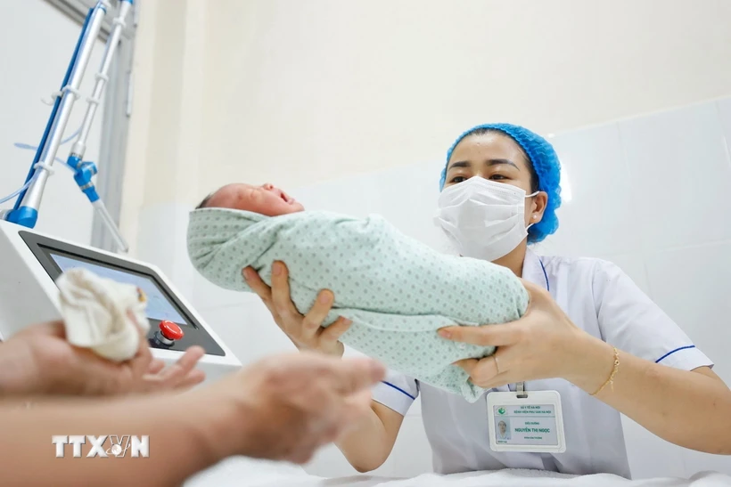 Vietnam drops two-child limit as birth rate falls, population ages