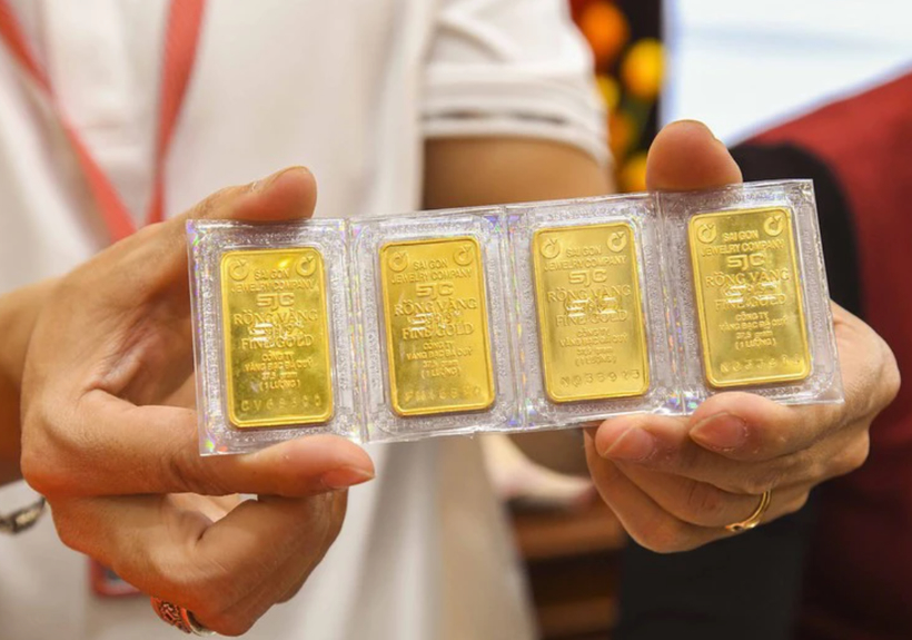 Gold, dollar edges up