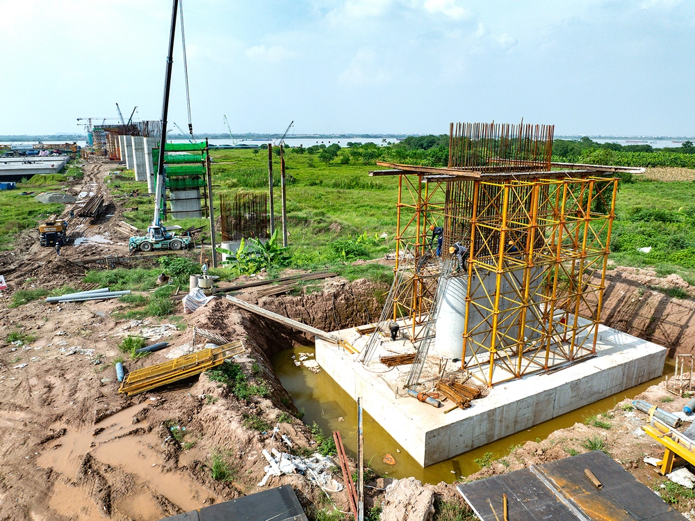 7 Cây cầu qua sông Hồng biến đổi không gian đô thị Hà Nội năm 2026 - Ảnh 7.