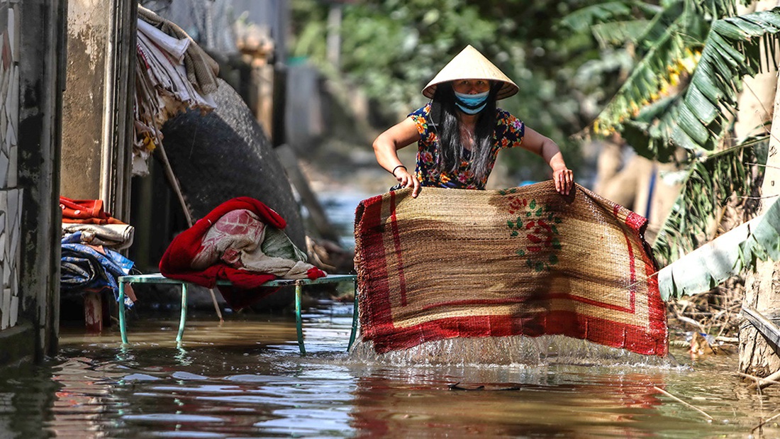 Lũ rút xuống, người đứng lên - Ảnh 6.