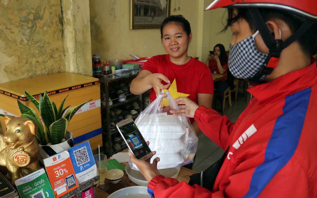 Thanh toán không tiền mặt lan rộng - Ảnh 2.