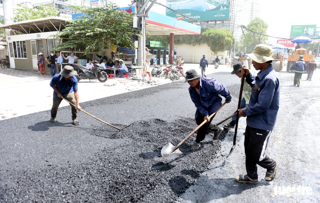 Trên đại công trình Nguyễn Hữu Cảnh chờ thông xe ngày 30-4 - Ảnh 3.