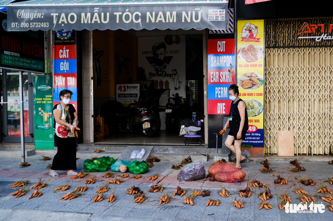 Đà Nẵng ngày thứ 3 phong tỏa, dân chấp hành nghiêm ở nhà, đường phố vắng lặng - Ảnh 2.