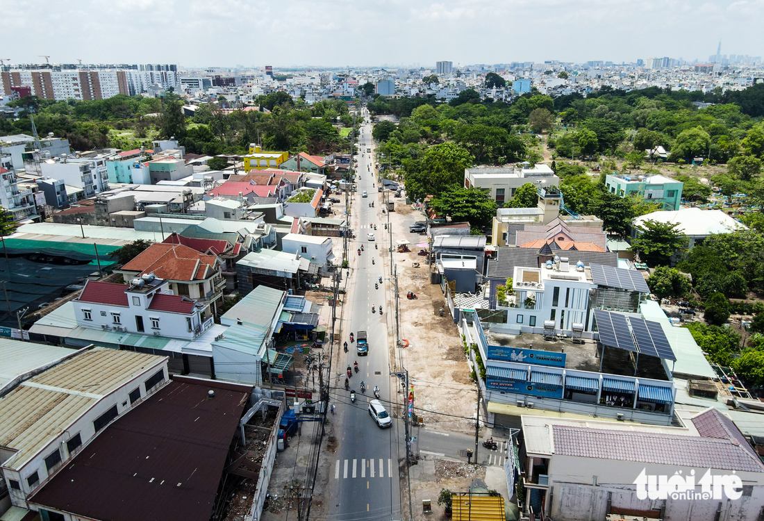 Người dân mong sớm hoàn thành dự án mở rộng đường Tân Kỳ Tân Quý - Ảnh 1.