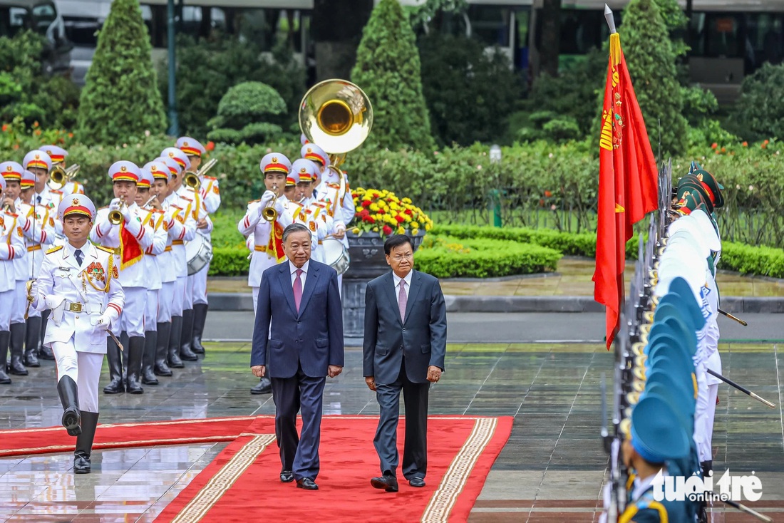 21 phát đại bác trong lễ đón trọng thể Tổng Bí thư, Chủ tịch nước Lào - Ảnh 6.