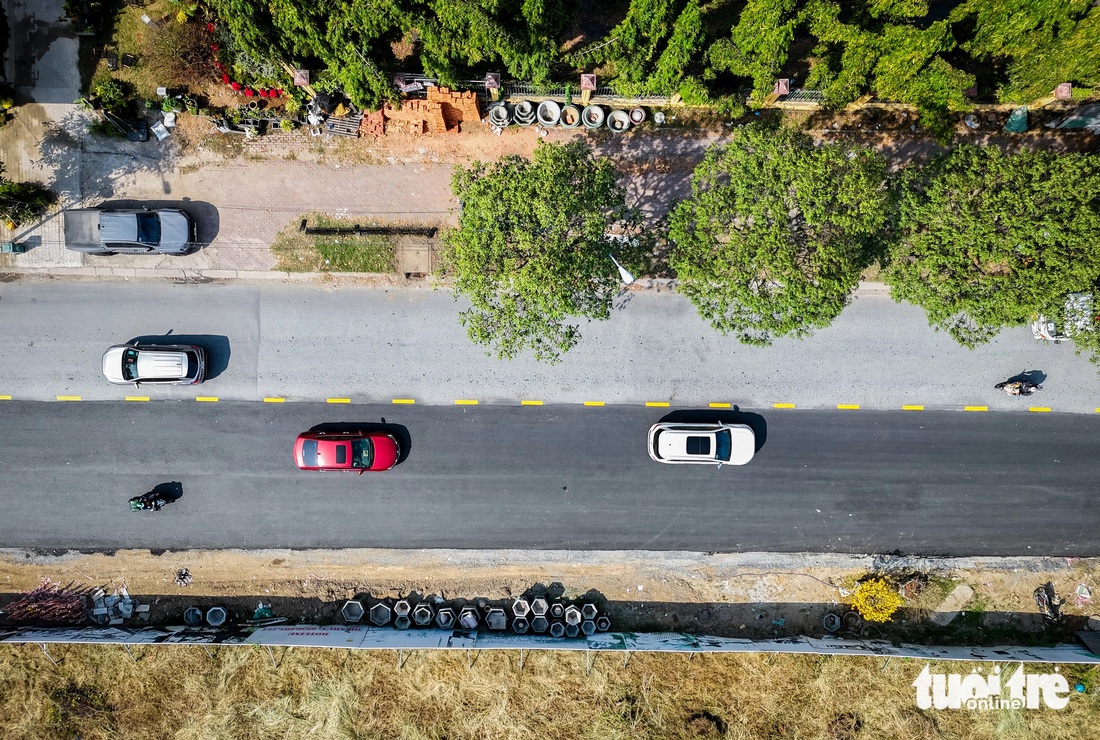 Mở rộng đường Nguyễn Hoàng giữa hai khu đô thị ở An Phú sau hơn hai thập kỷ - Ảnh 6.