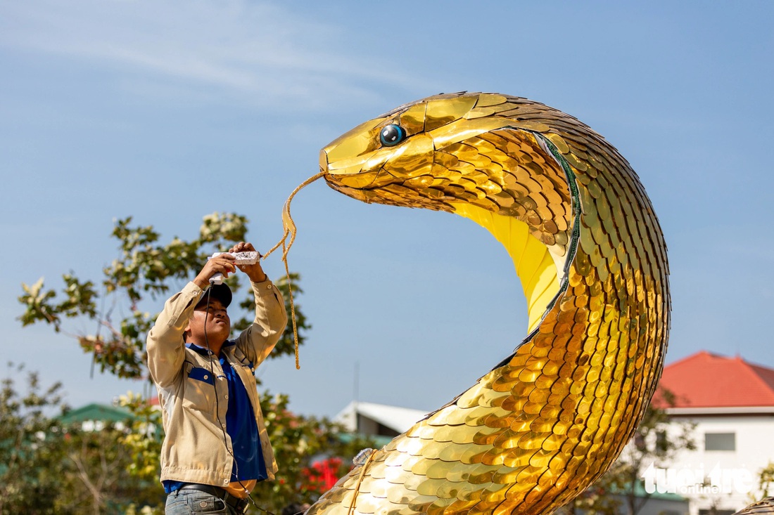 Cặp linh vật rắn ngộ nghĩnh cho tình hữu nghị Việt Nam - Lào - Ảnh 6.