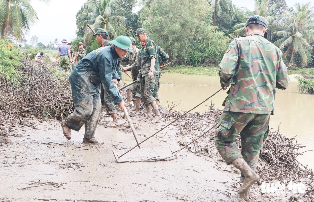 giúp dân - Ảnh 2.